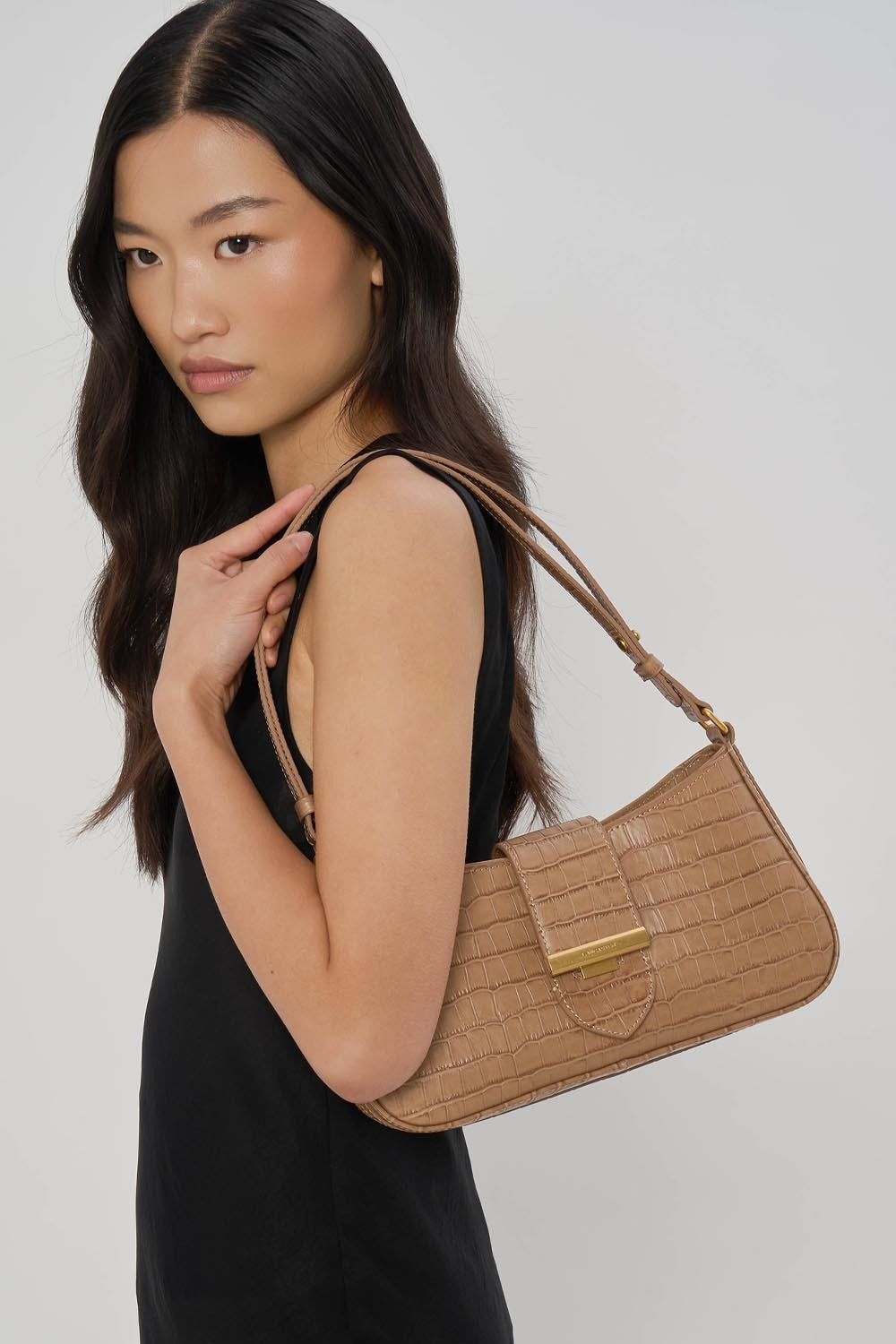 Axlartaska,  Exo Ily, Sandbrún